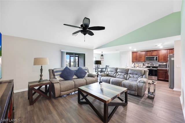 living room featuring high vaulted ceiling, dark wood-type flooring, and ceiling fan