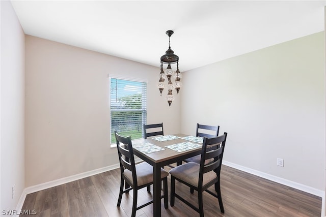 dining room featuring dark hardwood / wood-style floors