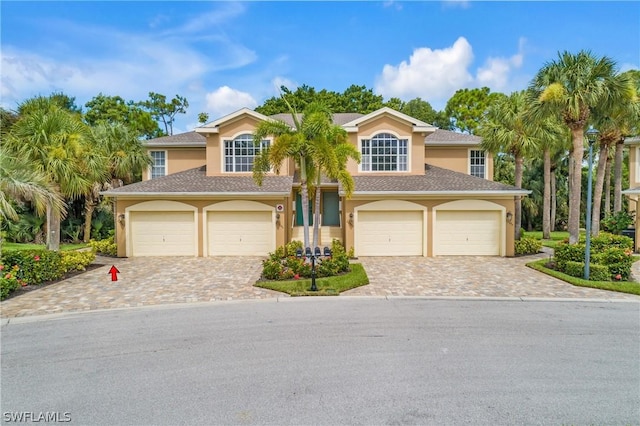 view of front of home with a garage