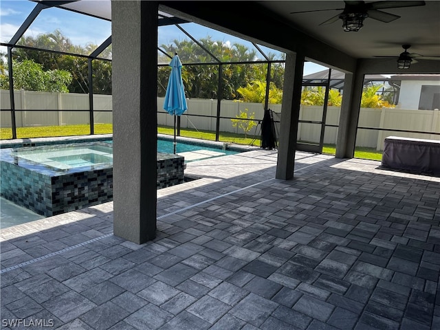 unfurnished sunroom featuring a pool and ceiling fan