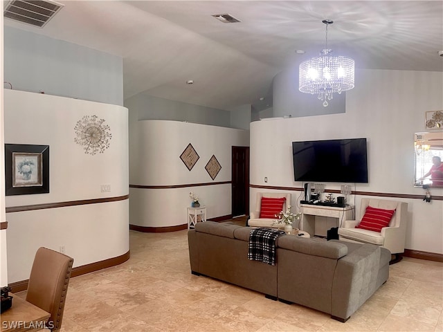 living room with light tile patterned floors, vaulted ceiling, and a chandelier