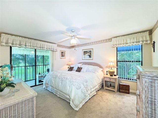 bedroom featuring carpet flooring, access to outside, and ceiling fan