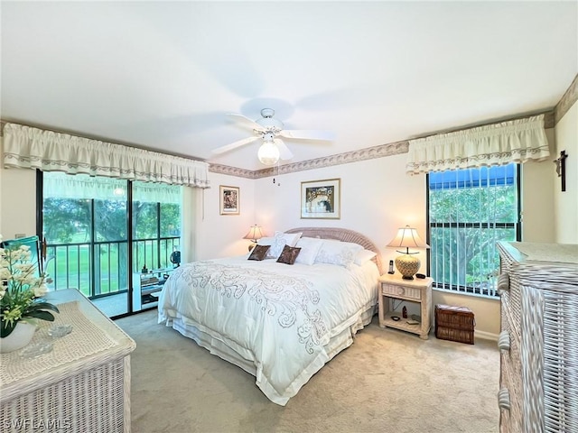 bedroom with ceiling fan, access to exterior, and light carpet