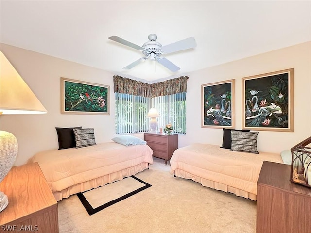 bedroom with carpet flooring and ceiling fan