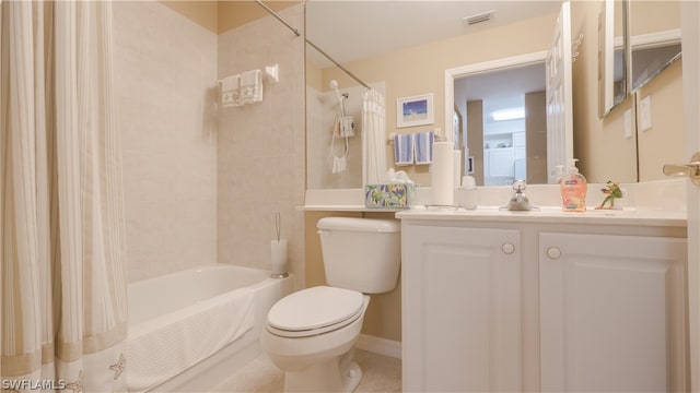 full bathroom with vanity, shower / tub combo with curtain, toilet, and tile patterned floors