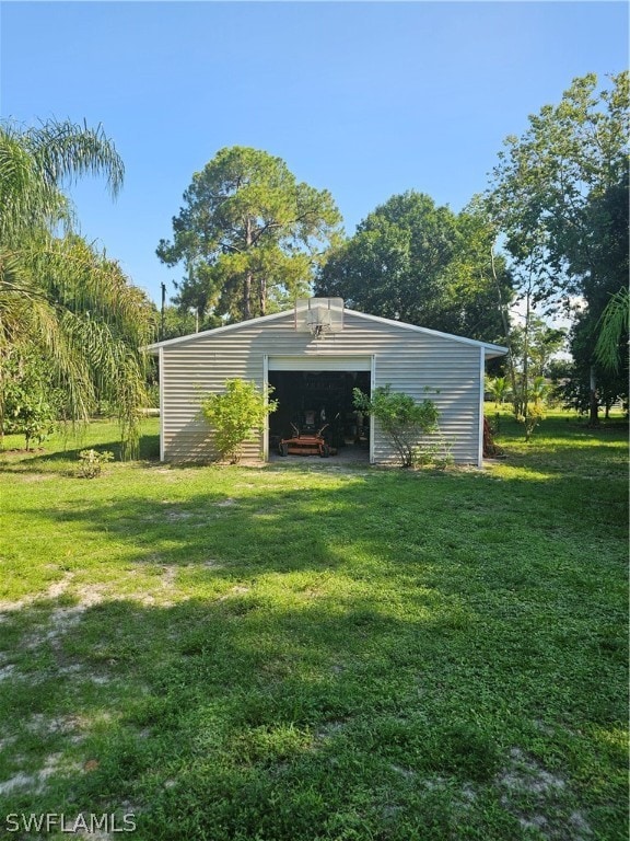 exterior space featuring an outbuilding