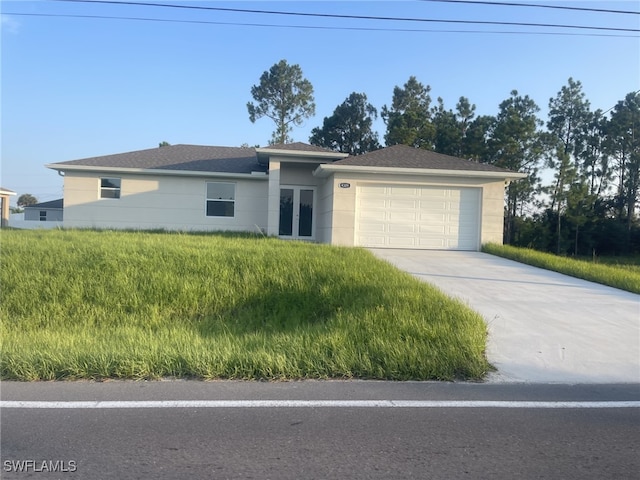 ranch-style house featuring a garage