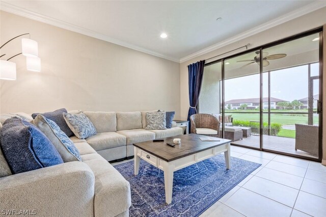 living room featuring crown molding, ceiling fan, and light tile patterned floors