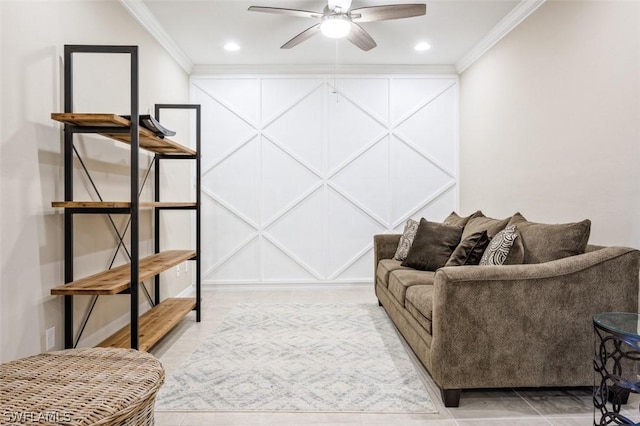 living room with ceiling fan and ornamental molding