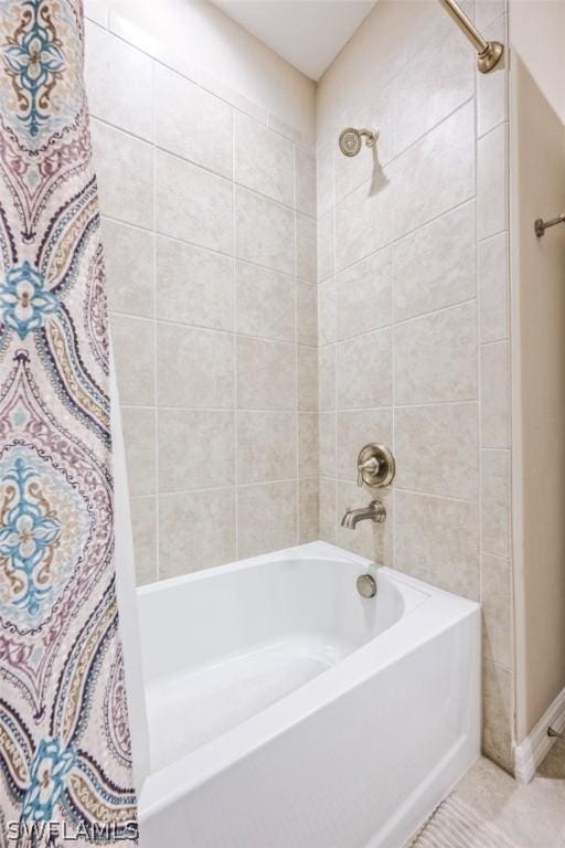 bathroom featuring shower / bath combination with curtain