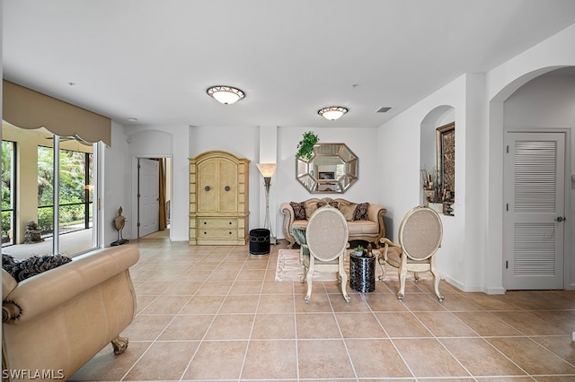 dining room with light tile patterned flooring