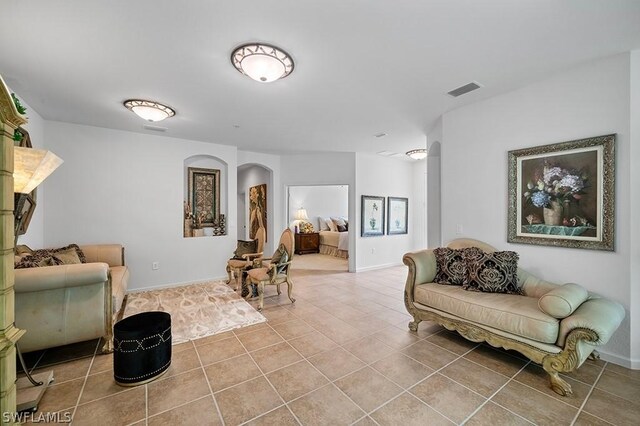 sitting room with light tile patterned floors