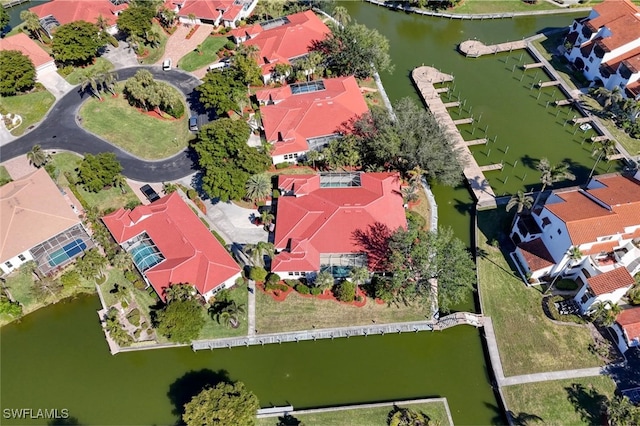 bird's eye view with a water view