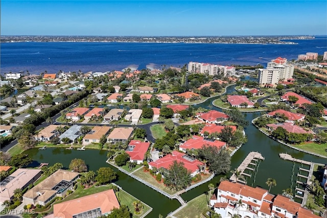 drone / aerial view with a water view