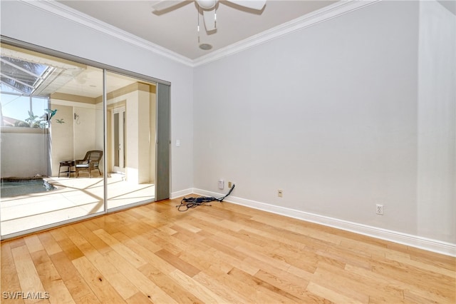 unfurnished room with crown molding, hardwood / wood-style flooring, and ceiling fan