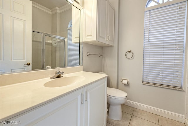 bathroom featuring tile patterned floors, toilet, an enclosed shower, crown molding, and vanity