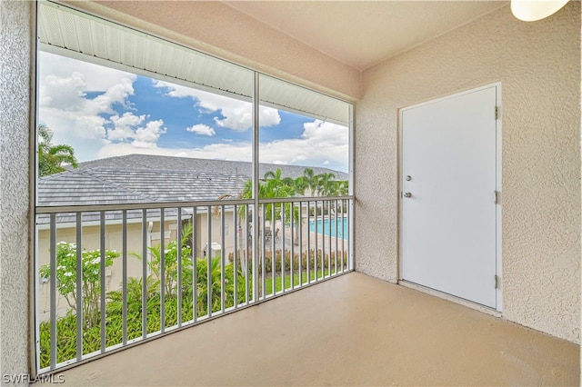 unfurnished sunroom with a wealth of natural light