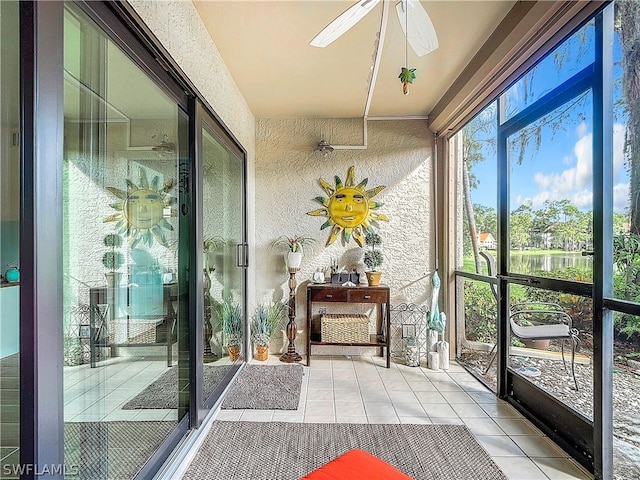 sunroom / solarium with ceiling fan