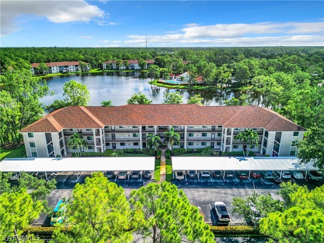 drone / aerial view featuring a water view