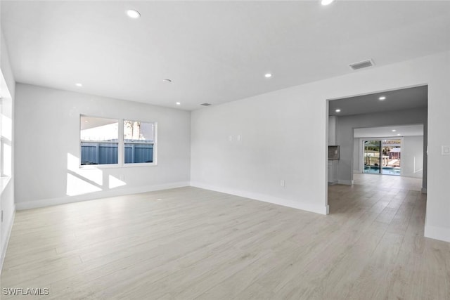 unfurnished room featuring light wood-type flooring