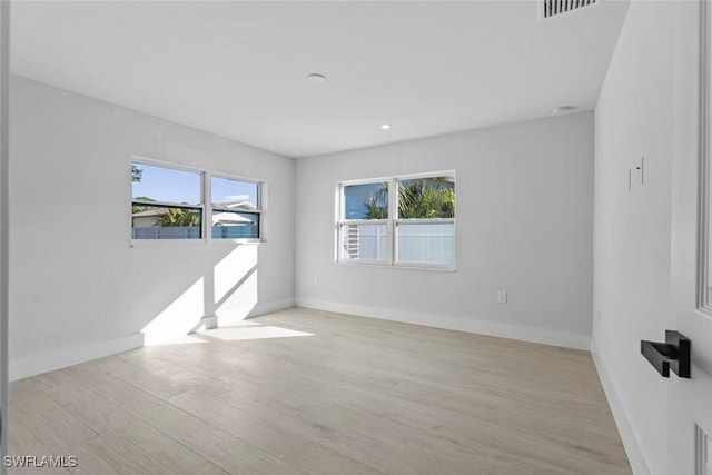 empty room featuring light hardwood / wood-style floors