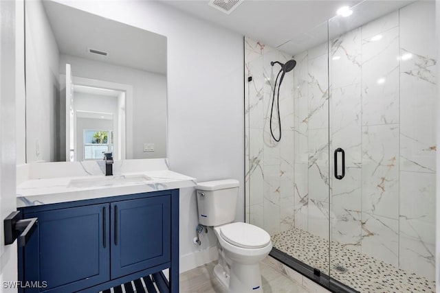 bathroom with vanity, toilet, wood-type flooring, and walk in shower