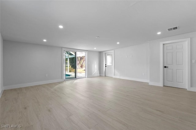 empty room with light wood-type flooring