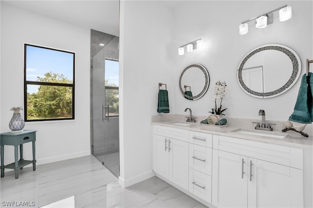 bathroom with vanity and an enclosed shower