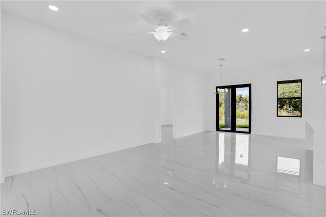 empty room featuring ceiling fan