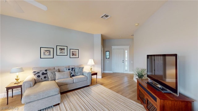 living room with light hardwood / wood-style floors