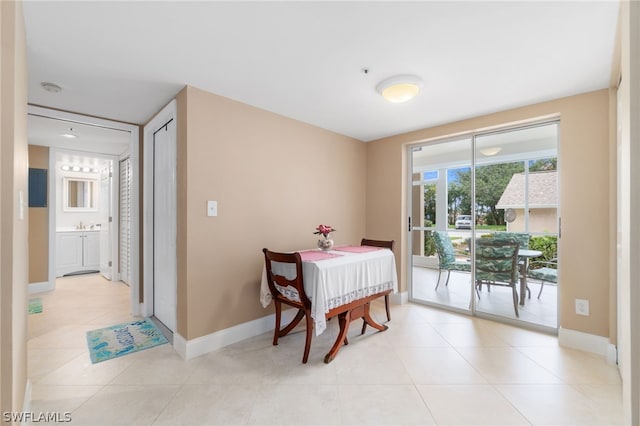 12520 Kelly Greens Blvd Unit 342, Fort Myers, FL 33908 - dining area with light tile patterned floors and baseboards