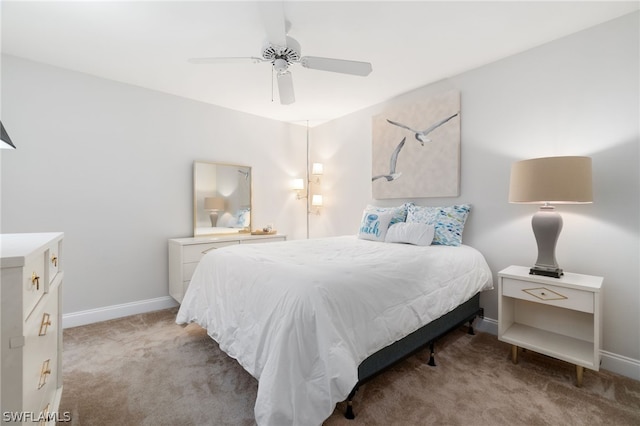 12520 Kelly Greens Blvd Unit 342, Fort Myers, FL 33908 - bedroom featuring ceiling fan, baseboards, and light colored carpet
