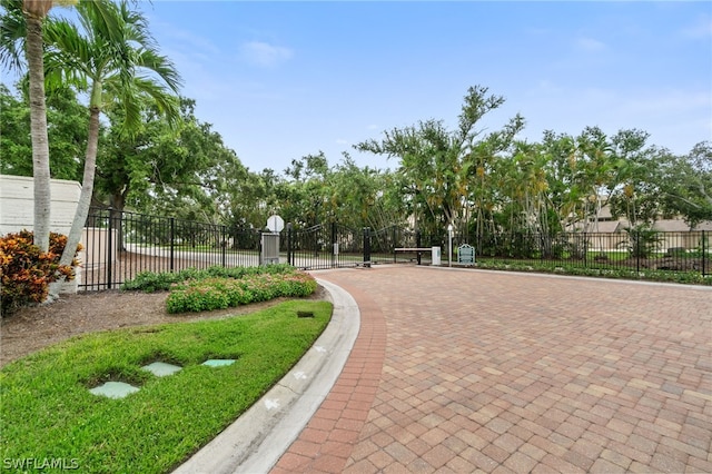 view of community featuring a gate and fence