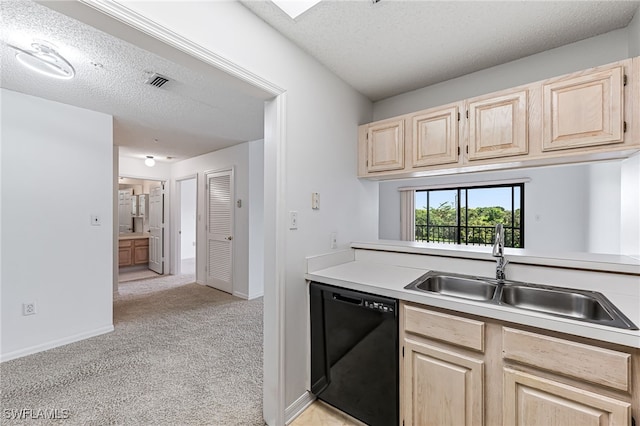 kitchen with light carpet, visible vents, dishwasher, light countertops, and a sink