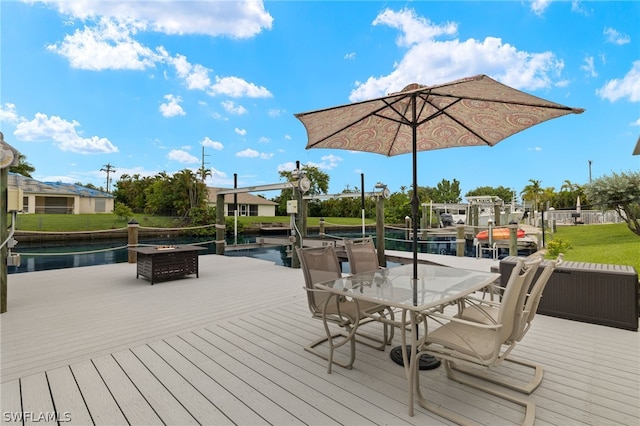 wooden deck featuring a boat dock