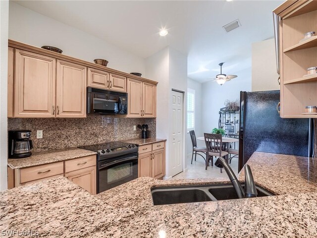 kitchen featuring decorative backsplash, black appliances, light brown cabinetry, and ceiling fan