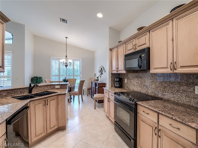 kitchen with black appliances, sink, light tile patterned floors, lofted ceiling, and a chandelier