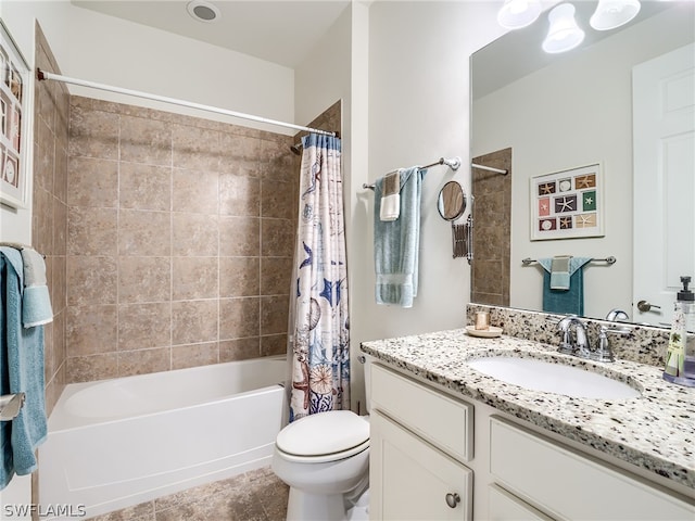 full bathroom featuring vanity, shower / bath combo, toilet, and tile patterned flooring