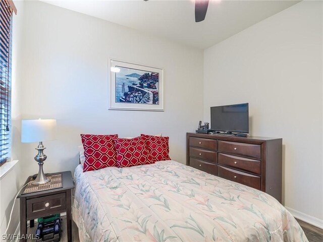 bedroom featuring wood-type flooring and ceiling fan