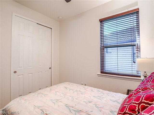 bedroom with a closet and ceiling fan