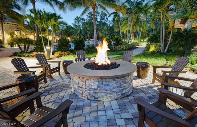 view of patio / terrace with an outdoor fire pit