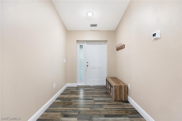 hall with dark wood-type flooring