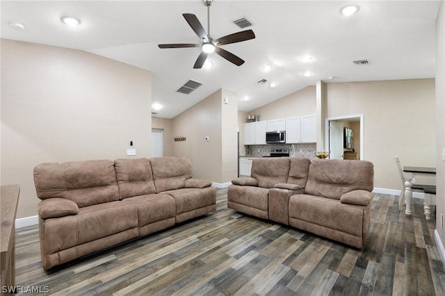 living room featuring dark hardwood / wood-style flooring, ceiling fan, and high vaulted ceiling