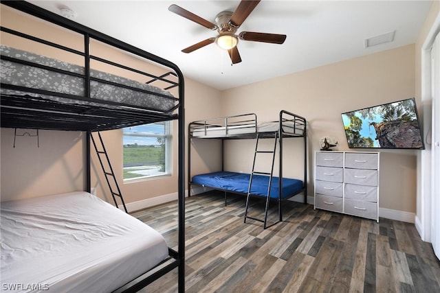 bedroom with hardwood / wood-style flooring and ceiling fan