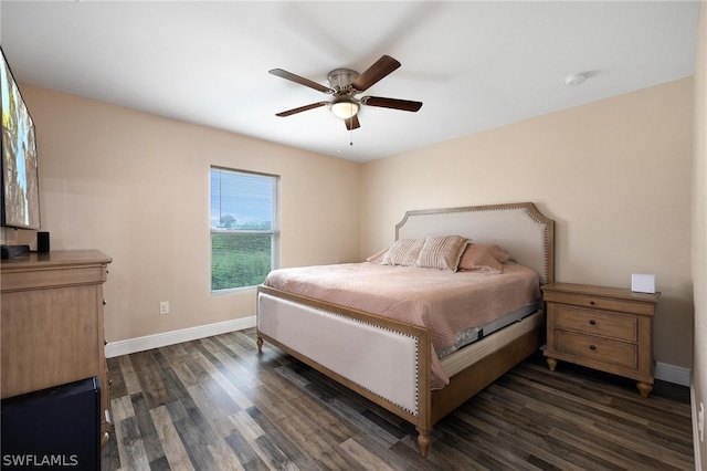 bedroom featuring ceiling fan and dark wood-type flooring