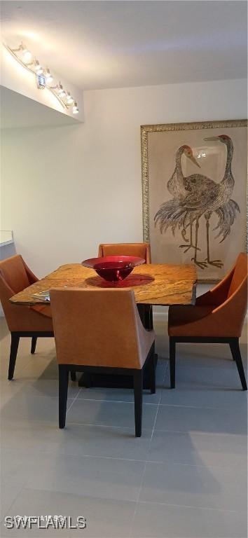 dining room with tile patterned floors