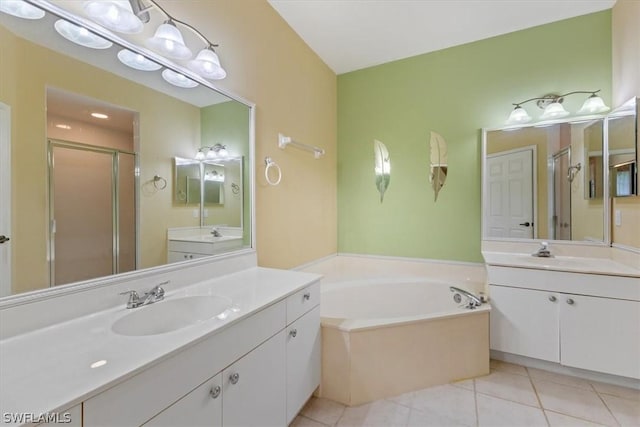 bathroom with vanity, tile patterned floors, and independent shower and bath