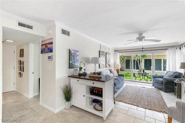 interior space featuring light tile patterned flooring, crown molding, and ceiling fan