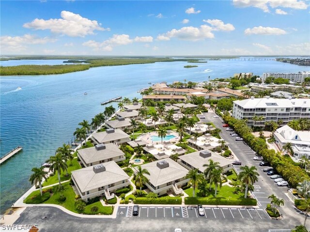 birds eye view of property featuring a water view