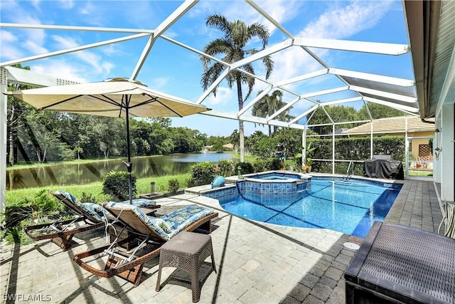 view of pool with a water view, an in ground hot tub, a patio area, and glass enclosure